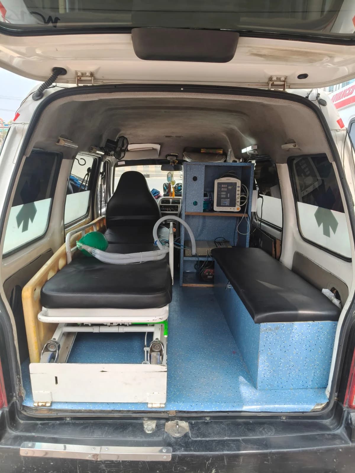 Inside a Best Ambulance Service ambulance — stretcher, oxygen support, and patient monitor